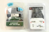 Two new in pkg holsters, one for S&W M&P Shield and one fits 2-3