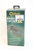 One Caldwell Universal brass catcher. In box.