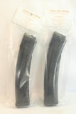 Two Sig Sauer extended pistol cartridge, looks to be for 45 ACP.