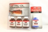 One Tru-oil gun stock finish kit, and one bottle of brass black. In packages.