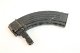 One SKS 7.62x39 30 round magazine.