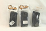 Three Ruger mini-14 magazines, in packages.