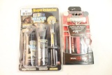 One Real Avid Accu-punch set for AR-15, and one Weapon Shield oil, lube kit. In packages.