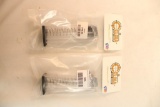 Two Kel Tec CP33 double stack magazines. In packages.