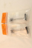 Two Kel Tec CP33 double stack magazines. In packages.