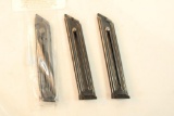 Three Ruger Mark II magazines.