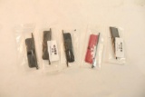 Five AR-15 dust covers. In packages.