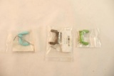 Five AR-15 dust covers. In packages.