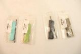 Five AR-15 dust covers. In packages.