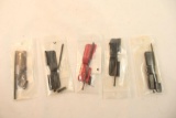 Five AR-15 dust covers. In packages.