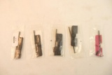 Five AR-15 dust covers. In packages.
