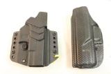 Two right handed holsters One belt, one belt clip inside.