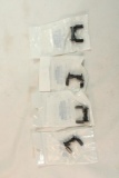 Four ambidextrous AR selector safeties. In packages.