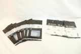 Three CMMG MK3 firing pin retainers, and nine Sig Sauer tapered firing pin blocks. In packages.