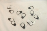Eleven AR 15 receiver stock latch plates. In packages.
