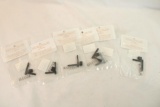 Six AR magazine releases. In packages.