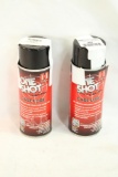 Two cans of Hornady One Shot case lube.