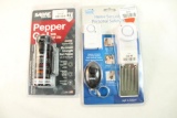 One Sabre door alarm and one one Sabre pepper gel spray. In packages.