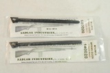Two M14/M1A spring guides. In packages.