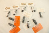 Ten black polymer trigger guards, new in pkgs