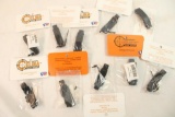 Ten black polymer trigger guards, new in pkgs