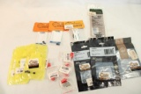 Bag containing 2 Sig Sauer O rings, one Weaver top mount base, 3 stock bushings, one M4 muzzle