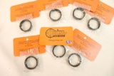 Seven castle nuts, new in pkg