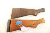 Two wood buttstocks