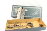 Smith & Wesson pistol box containing two Colt .45 Auto magazines, 3 recoil springs and other misc