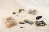 Bag with one threaded .45 barrel bushing adaptor, 4 quick release swivels, gun belt buckle, trigger