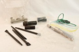 Four M14 spring guides, muzzle break, scope rings and rail, two firing pins with springs