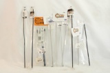 Eight various AR-15 gas tubes and a charging handle, all new in pkg
