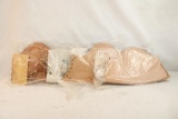 Three leather rifle cheek pads, new in pkg
