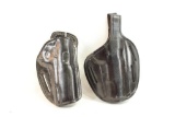 Two black leather holsters for .45 govt