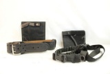 Black leather belt, two velcro Under Tech holsters and one single point gun sling