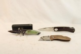 Bag containing 3 folding knives, one FT Tactical with 3