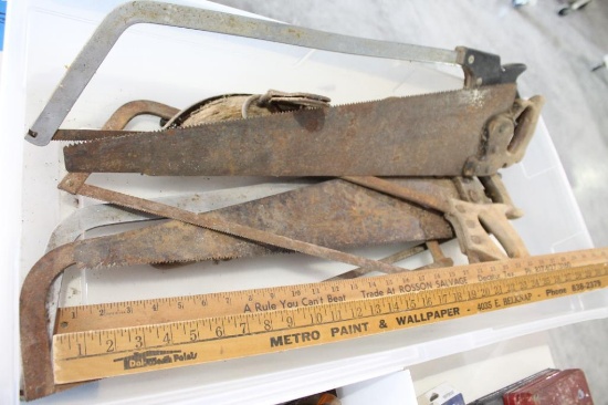 Lot containing two wood yard sticks and 6 hand saws