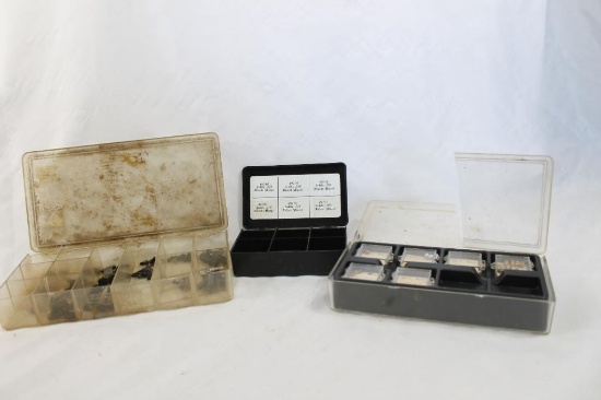 Three small boxes of sights, screws and pins