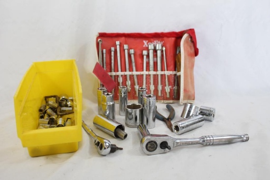 Box of ratchets and sockets and other tools