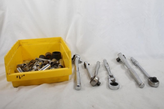 Box containing six ratchets and sockets