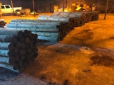 Bundle of 8 Foot-12 Foot round treated fence posts
