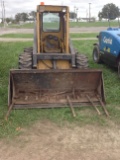 New Holland L553 Skid Loader