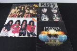 lot of KISS tour books and posters