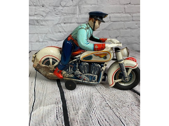 METAL POLICE OFFICER ON MOTORCYCLE MOVING TOY
