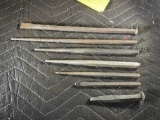 LOT OF 7 LONG HANDLED PUNCHES