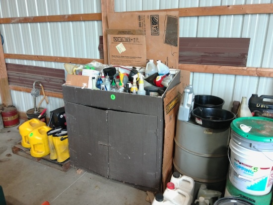 Wooden cabinet with Assorted Automotive Fluids