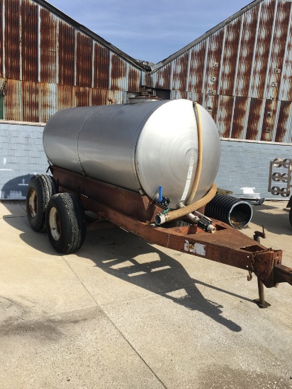1000 Gallon Stainless Steel Tandem Axle Trailer.