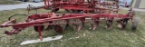 IH 710 6-18” Semi Mtd. Plow w/ buster bar