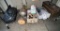 Contents of shelf - radio, paint brushes, tire inflator