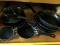 Drawer w/ cast iron skillet & misc. skillets